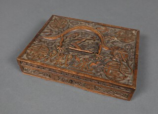 An Anglo Chinese deeply carved hardwood cigar box, the lid with stylised dragon and armorial with fitted interior 5cm x 29cm x 22cm 