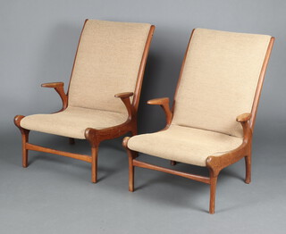 In the manner of Christian Sorensen for Gorm Mobler,  a pair of Danish mid-Century teak framed high back lounge chairs, upholstered in cream fabric 87cm h x 57cm w x 48cm d 