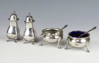 A Victorian silver table salt London 1892, 1 other and 3 condiments with 2 spoons 279 grams  

