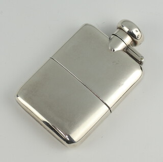 A small silver hip flask with cup base Birmingham 1945 118 grams, 9cm 