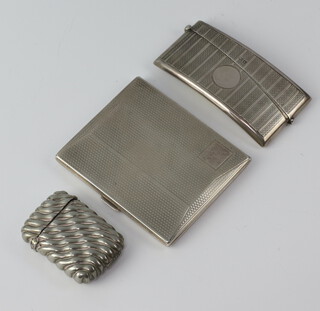 An Art Deco silver engine turned cigarette case, London 1929, ditto card case and a fluted vesta, 130 grams gross