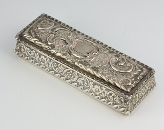 An Edwardian silver repousse rectangular trinket box with vacant cartouche and floral decoration Birmingham 1901, 13cm, 90 grams