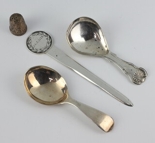 A William IV silver caddy spoon London 1837, 1 other, a paper knife and thimble