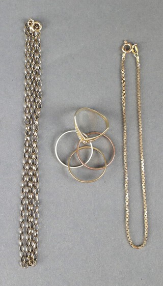 A yellow metal 9k necklace 54cm, a bracelet and 2 rings 11.2 grams