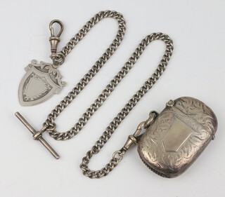 An Edwardian silver vesta Birmingham 1901, an Albert and fob, gross weight 50 grams