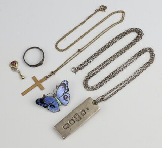 A silver ingot pendant and chain, a yellow metal 9ct cross pendant, a ditto pendant, ring and brooch 