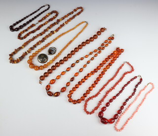 A natural coral necklace and minor amberoid and other necklaces 