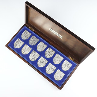 A set of 12 Yorkshire Mint silver medallions - The Royal Arms, Birmingham 1976, approx. 576 grams, contained in a fitted case with certificate 