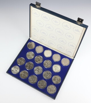 A cased set of Eisenhower dollars 1971 to 1978 in a fitted case