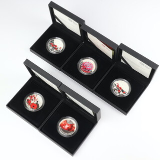 Five Royal Mint silver enamelled proof five pound Remembrance Day coins - 2015, 2016, 2017 (x2) and 2018, all boxed with certificates and outer boxes 