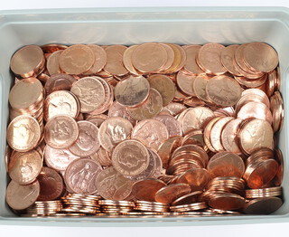 A large quantity of polished pennies, mixed dates 