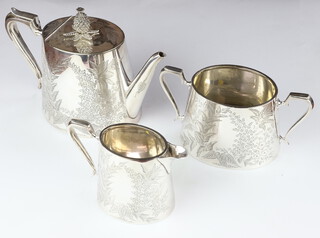 An Edwardian silver plated engraved 3 piece tea set by Mappin & Webb