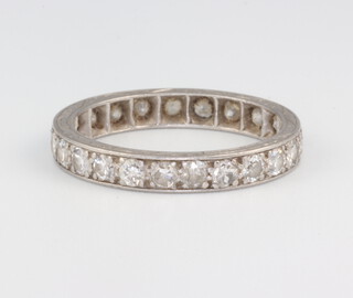 A white metal stamped Plat diamond eternity ring comprising 24 brilliant cut diamonds each approx. .03ct, 3 grams, size L 1/2