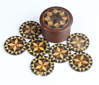 Seven Victorian Tunbridge Ware gaming counters 25mm (1 a/f) contained in a ditto box