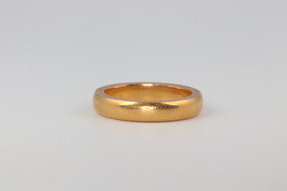 A 22ct yellow gold wedding band 8.7 grams, size N 1.2 