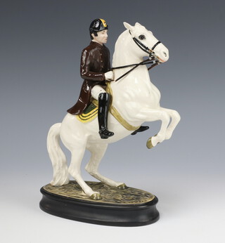 A Beswick figure Lipizzaner with rider no.2467, second version, white gloss, modelled by Graham Tonge 25.4cm 