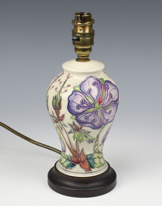 A modern Moorcroft baluster table lamp decorated with flowers 19cm 