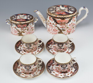 A Royal Crown Derby Imari pattern part tea set comprising teapot (stuck finial), a sucrier with lid, 4 cups (2 a/f), 4 saucers (2 riveted)