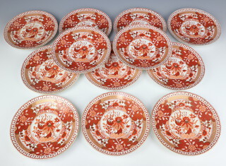 Twelve 19th Century ochre Imari pattern dessert plates 22cm (5 a/f)