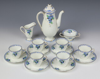 An Art Deco Royal Doulton Flora pattern coffee set comprising coffee pot, 6 cups, 6 saucers, sugar bowl and cream jug 