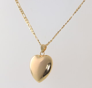 A yellow metal 585 necklace and heart pendant, a yellow metal 9ct necklace heart pendant, cross pendant and bar brooch