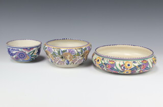 A Poole Carter Stabler deep bowl decorated with flowers 7cm, a ditto 8cm and a shallow bowl 14cm 