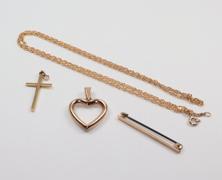 A 9ct yellow gold necklace 46cm, a ditto heart pendant, cross pendant and bar brooch 7.2 grams