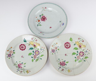 Three Chinese export famille rose dishes, Qing dynasty, Qianlong period one painted with peony and a pair painted with three flower sprays 23cm diameter (3)