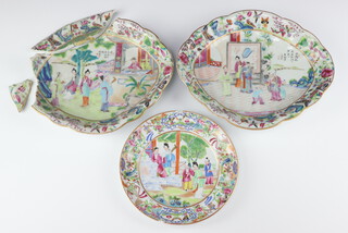 A pair of oval Canton famille rose dishes, late Qing dynasty,27 cm a ditto plate 19.5  painted with figures and flowers