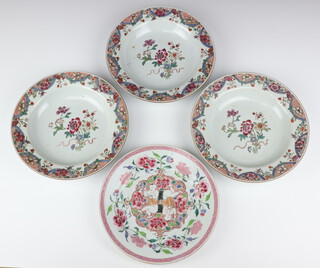 Four Chinese export famille rose bowls, Qing dynasty, Qianlong period, one painted with two reclining boys and peony, the other three with a spray of flowers, 22.5cm and 22.8cm diam respectively