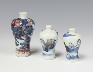 Three small underglaze blue and copper red miniature meiping vases, 20th Century, one painted with a dragon, the pair with a camel and figures, 8cm - 11cm high