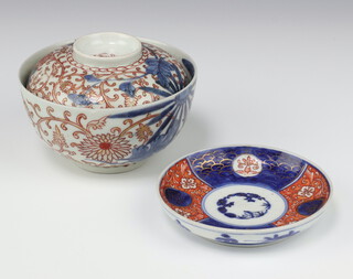 A Japanese Imari bowl and cover, Meiji period painted with flowers, 12.5cm diam together with a small Imari dish, 11.5cm diam (3)