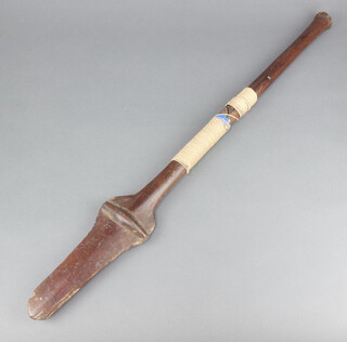 A 19th Century Fijian Cula Cula paddle club with break to central shaft 74cm l