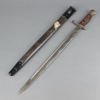 A 1913 Remington bayonet complete with scabbard 