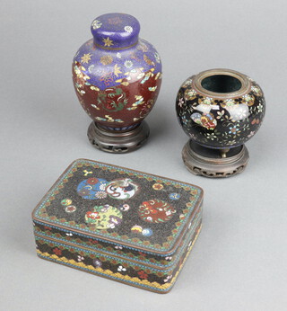 A rectangular black ground and floral patterned cloisonne enamelled jar and cover 4cm x 10cm x 9cm, a blue and red ground ditto ginger jar and cover 9cm x 5cm (damage to side) and a ditto black ground urn and cover decorated butterflies 6cm 