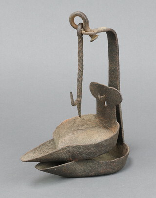 An 18th/19th Century iron crusie lamp 20cm x 17cm x 9cm 