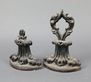 A Victorian shaped cast iron doorstop the reverse marked W E & Co 41 and 1 other marked 472 