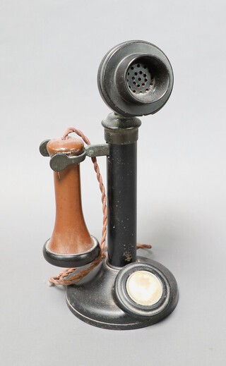 An internal candlestick telephone 32cm