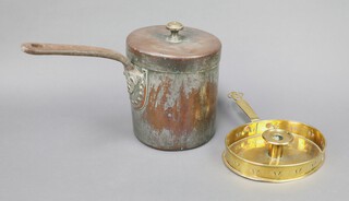 An 18th Century oval pierced copper Continental chamber stick 3cm x 19cm x 14cm together with a silvered copper saucepan and lid marked R.E L2 19cm x 16cm 