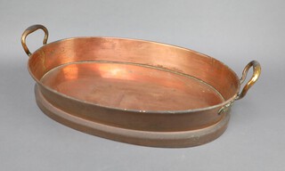 A 19th Century oval copper twin handled tray 10cm x 47cm x 32cm 