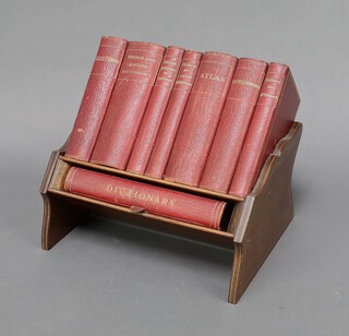 An Asprey's Perfect Library Gazetteer comprising French English Dictionary, English Quotations and Proverbs, French and Latin Quotations, Atlas, Encyclopaedia, Classics and Mythology and a Dictionary, all contained in an inlaid mahogany book trough 10cm h x 20cm w x 16cm d 