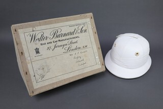 Walter Barnard and Sons, a polo helmet complete with chin strap, contained in a Walter Barnard cardboard box, size 6 7/8