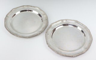 A pair of Georgian design white metal plates with engraved armorials 19.5cm 