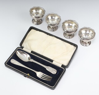 A set of 4 Victorian silver pedestal salts Birmingham 1892 and a silver fork, 166 grams 