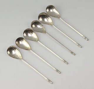 A set of 6 stylish Arts and Crafts silver coffee spoons with hammer pattern bowls, Chester 1928, stamped Keswick 