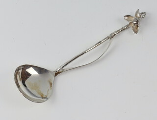 A Sarah Jones silver spoon with floral terminal, London 1980