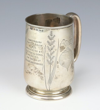 A Victorian silver mug engraved with a carrot and radish and inscription For The Canterbury Cattle Show 1877, Birmingham 1876, 228 grams, 12.5cm 