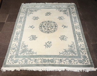 A grey and white ground Indian carpet with central medallion 303cm x 244cm 