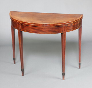 A Georgian crossbanded and inlaid mahogany D shaped card table raised on square tapered supports, spade feet 73cm h x 92cm w x 46cm d 