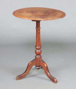 A Victorian oval bleached mahogany wine table, raised on a turned column and tripod base 71cm h x 54cm w x 42cm d 